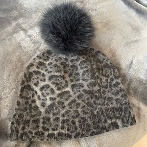 Beautiful, luminous cashmere cheetah print hat with fox pompon from Finland!
